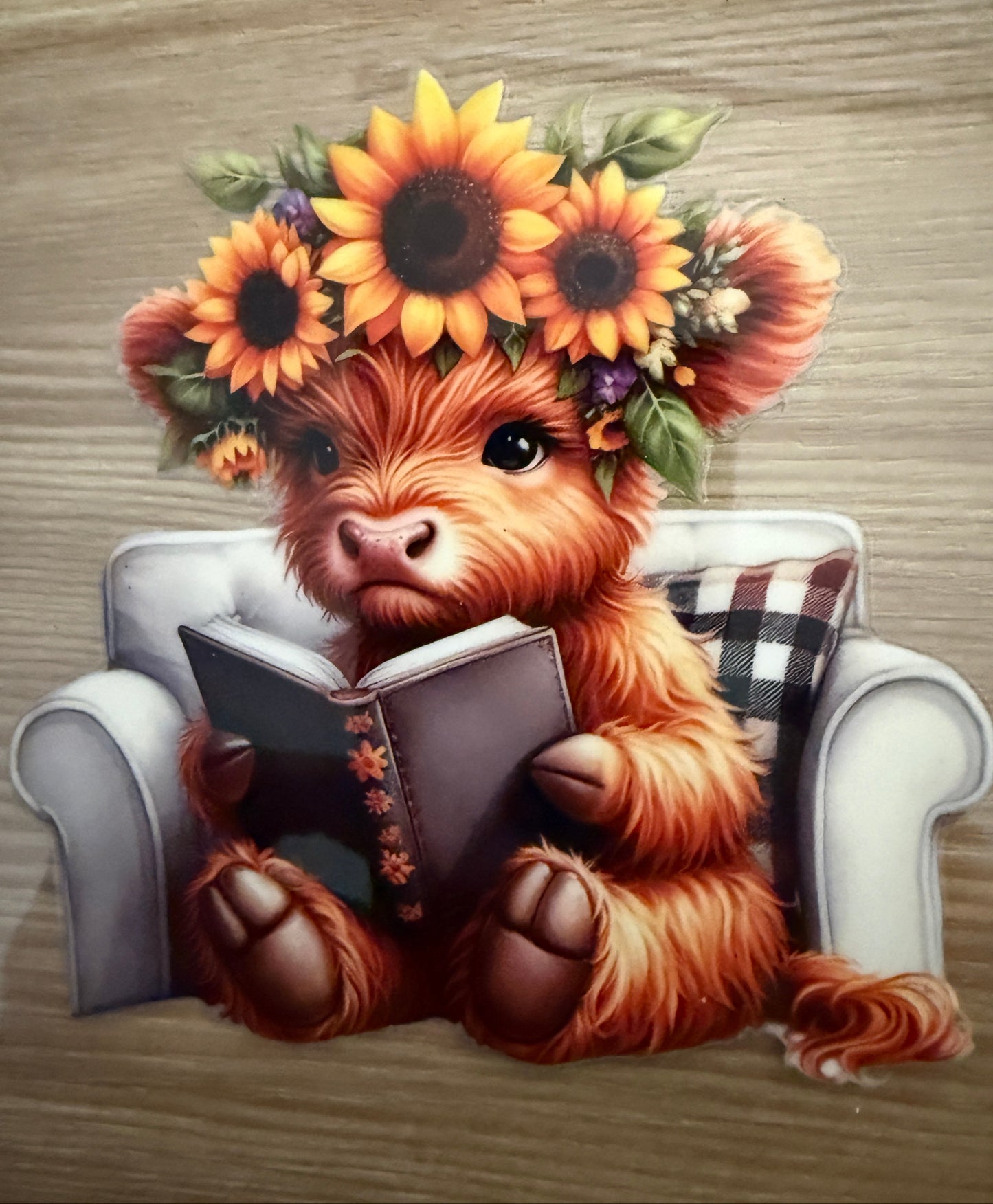 Decal - Cow reading a book while sitting in a chair